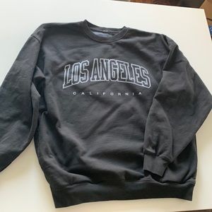 Brandy Melville Los Angeles crewneck sweatshirt with side pockets.